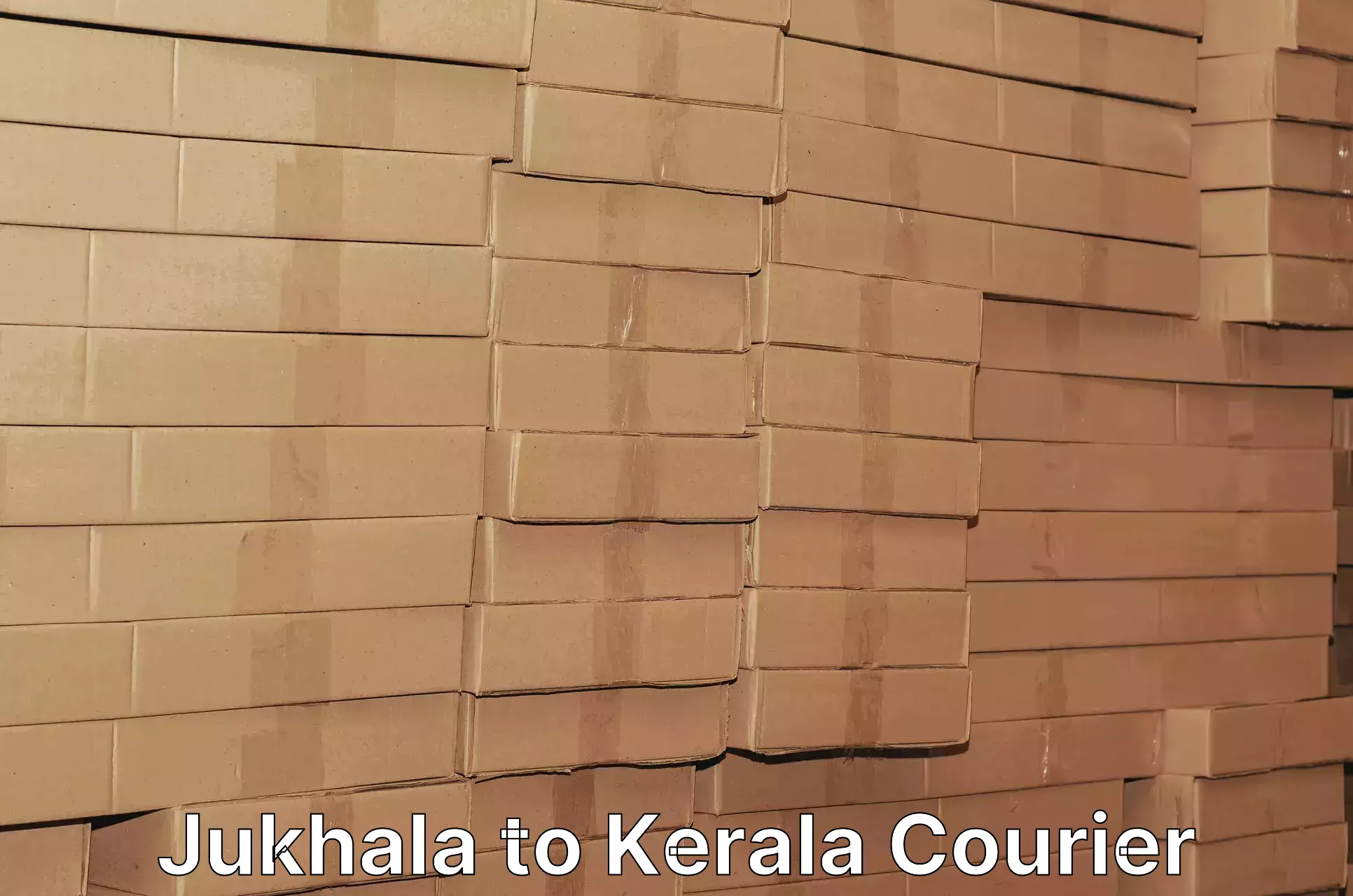 Return courier service Jukhala to Kumily