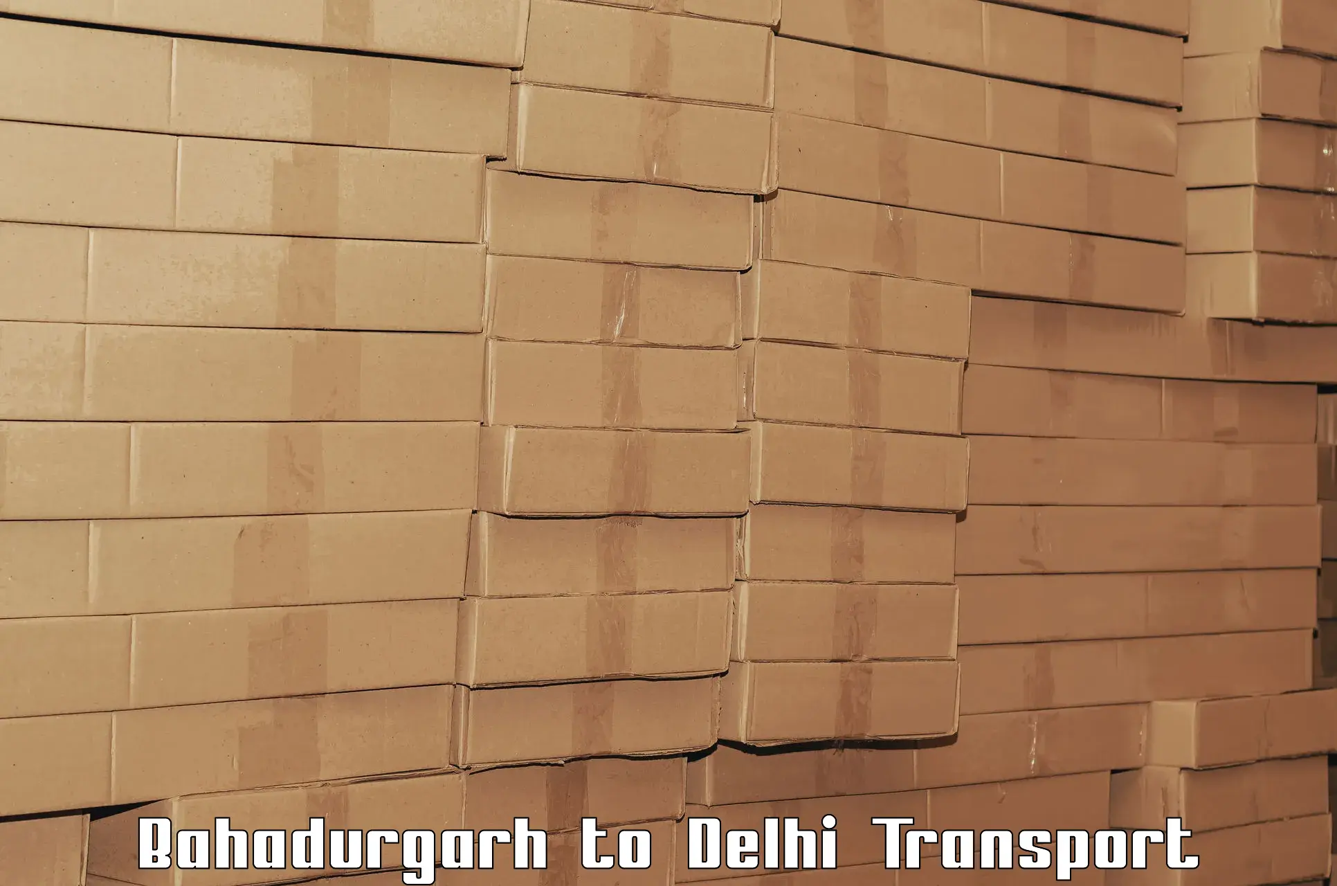 Daily transport service Bahadurgarh to East Delhi